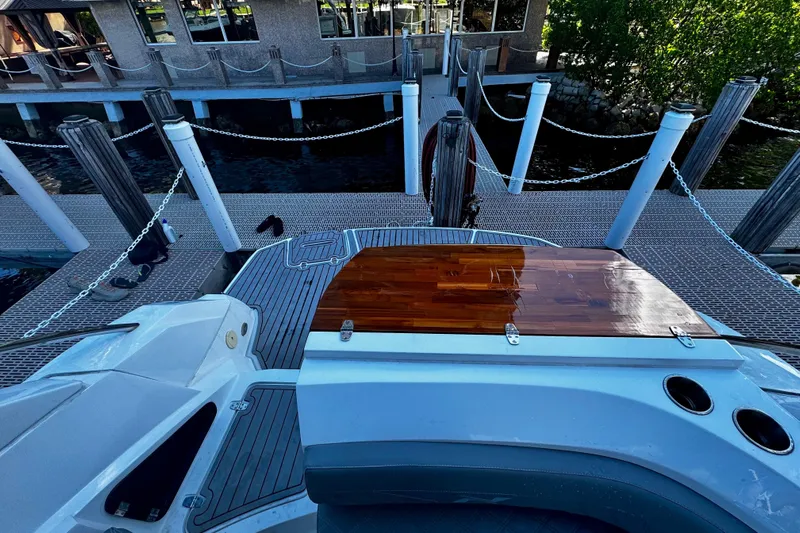  Yacht Photos Pics 2024 NX Boats NX 280 docked, showcasing sleek design and modern features.