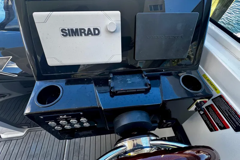  Yacht Photos Pics 2024 NX Boats NX 280 dashboard with Simrad and Volvo Penta displays.