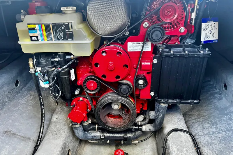  Yacht Photos Pics Engine compartment of 2024 NX Boats NX 280, featuring a red Volvo Penta engine.