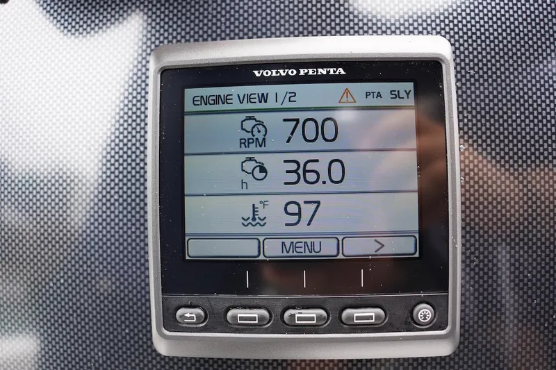 Tender 2 Yacht Photos Pics Volvo Penta engine display showing RPM, hours, and temperature on Novurania Chase 2020.