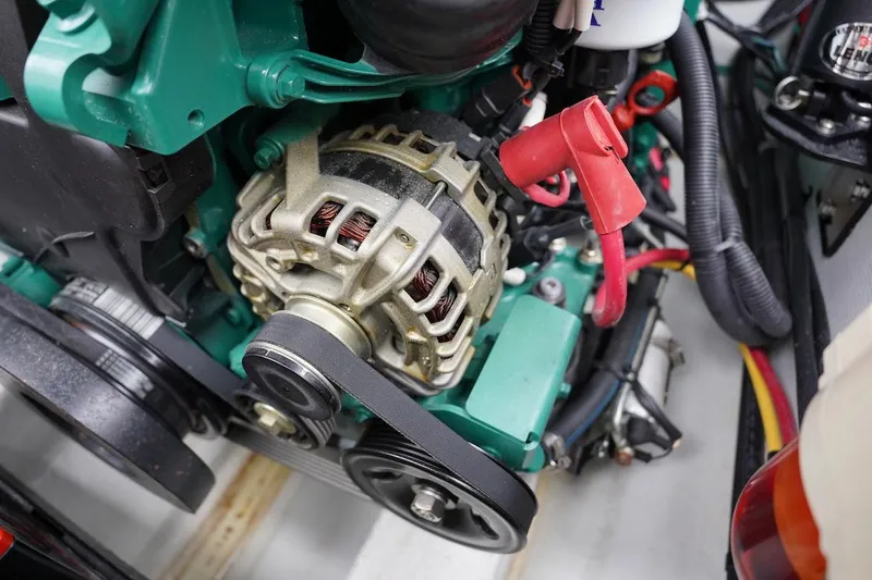 Tender 2 Yacht Photos Pics Close-up of a 2020 Novurania Chase engine component with visible alternator and wiring.