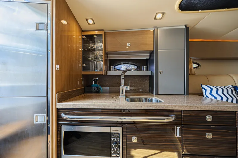  Yacht Photos Pics Interior of 2013 Formula 400 Super Sport yacht kitchen with modern amenities.