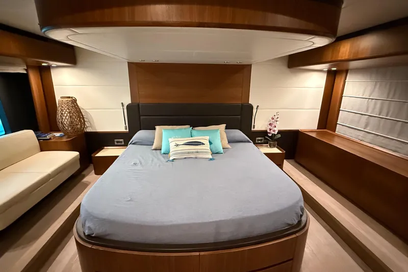 Grace Yacht Photos Pics Luxurious bedroom interior of 2016 Absolute NAVETTA 58 yacht with modern design and cozy ambiance.