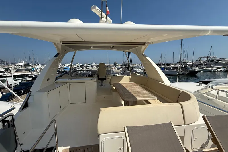 Grace Yacht Photos Pics Luxurious 2016 Absolute NAVETTA 58 yacht with spacious deck and marina view.