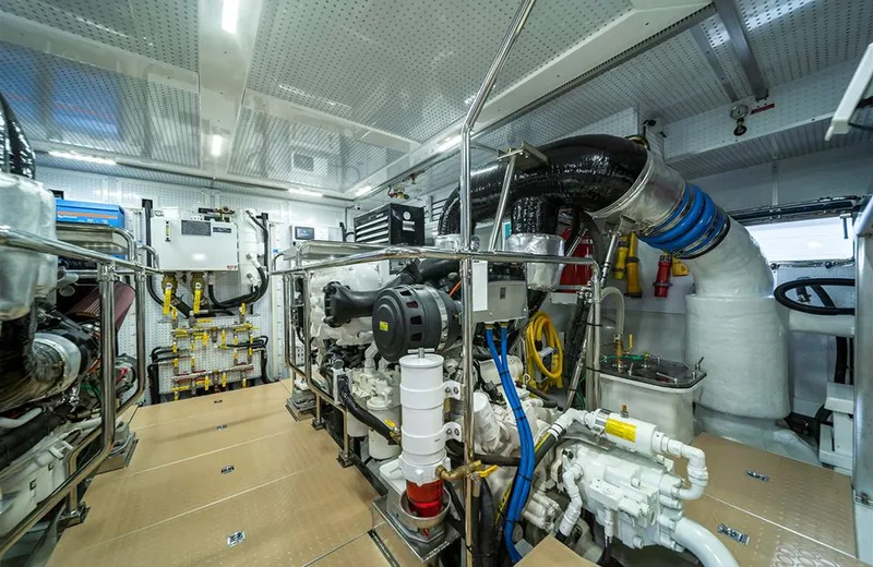 Julianne (name Reserved) Yacht Photos Pics Engine room of 2022 Outer Reef Yachts 900 Motoryacht, showcasing advanced machinery and equipment.