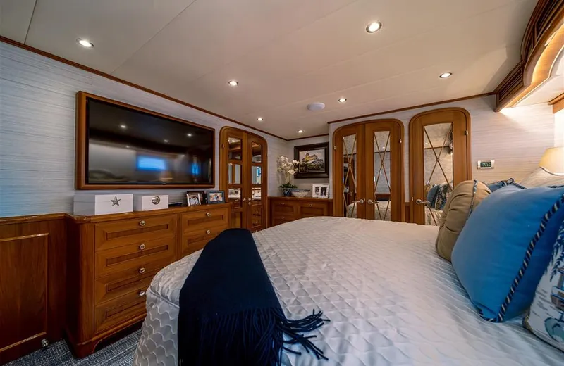 Julianne (name Reserved) Yacht Photos Pics Luxurious bedroom in 2022 Outer Reef Yachts 900 Motoryacht with elegant wood finishes.