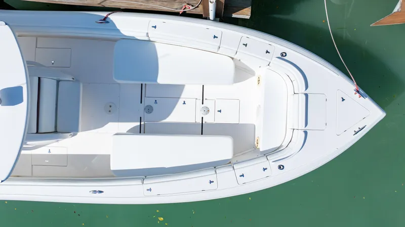  Yacht Photos Pics Top view of 2012 Intrepid 400 Center Console boat docked on water.