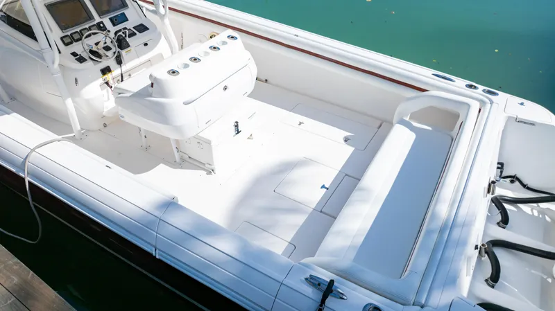  Yacht Photos Pics 2012 Intrepid 400 Center Console boat interior with seating and control panel.