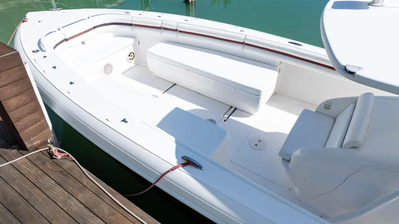  Yacht Photos Pics 2012 Intrepid 400 Center Console boat docked, featuring spacious seating and sleek design.