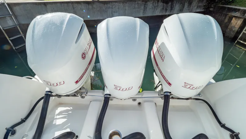  Yacht Photos Pics Triple outboard engines on a 2012 Intrepid 400 Center Console boat.
