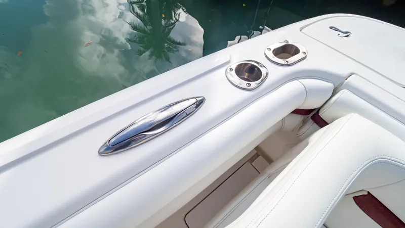  Yacht Photos Pics 2012 Intrepid 400 Center Console boat interior with white seating and cup holders.