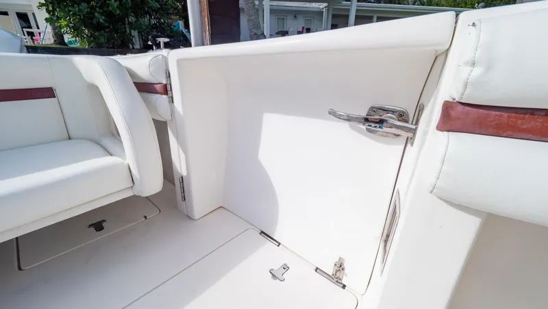  Yacht Photos Pics Interior of 2012 Intrepid 400 Center Console boat with white seating and sleek design.