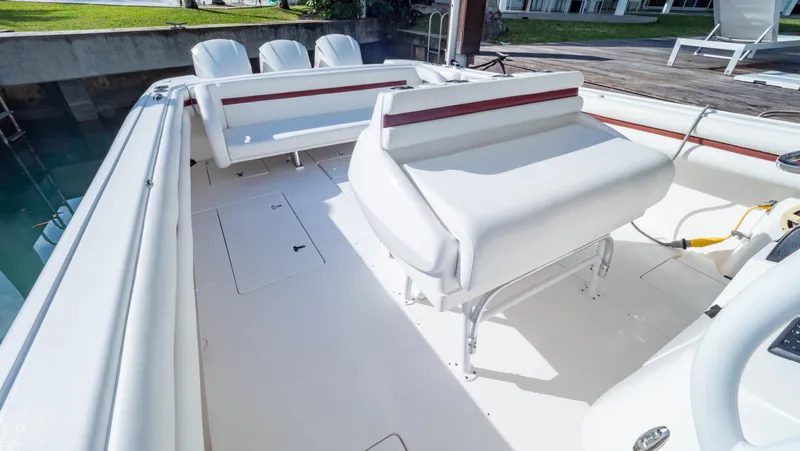  Yacht Photos Pics 2012 Intrepid 400 Center Console boat interior with white seating and spacious deck.