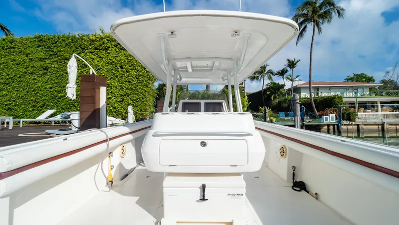  Yacht Photos Pics 2012 Intrepid 400 Center Console boat docked, featuring spacious deck and modern design.