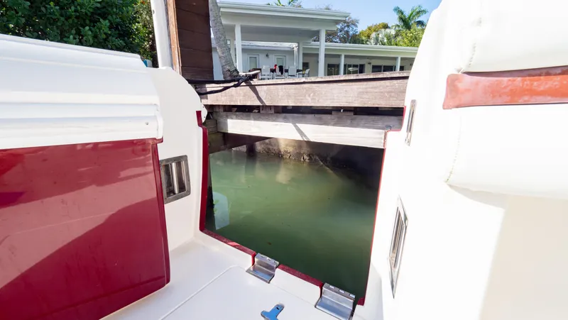  Yacht Photos Pics 2012 Intrepid 400 Center Console boat docked near waterfront home.