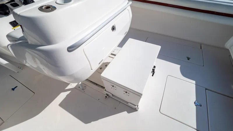  Yacht Photos Pics 2012 Intrepid 400 Center Console boat interior with white seating and storage compartments.