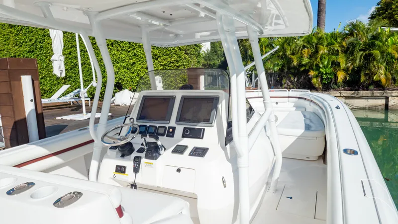  Yacht Photos Pics 2012 Intrepid 400 Center Console boat with modern navigation equipment and spacious deck.
