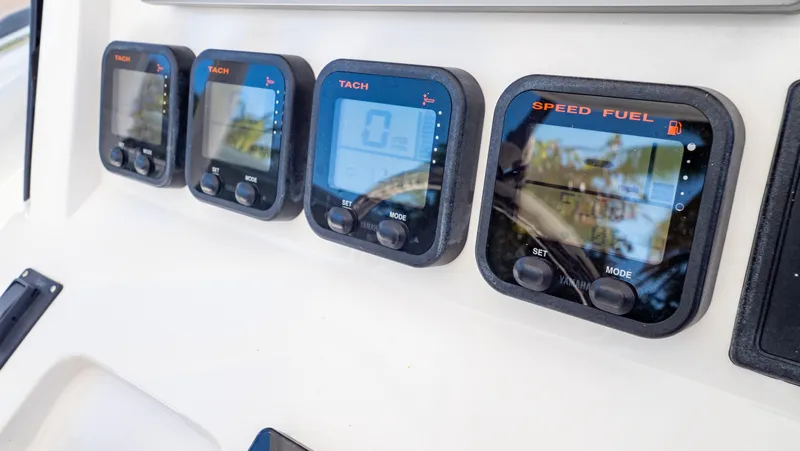  Yacht Photos Pics Dashboard gauges on a 2012 Intrepid 400 Center Console boat.