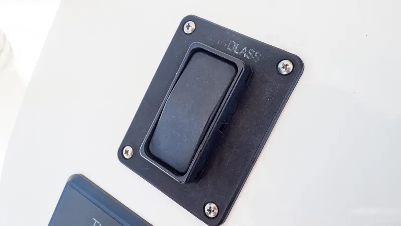  Yacht Photos Pics Close-up of a switch on a 2012 Intrepid 400 Center Console boat.