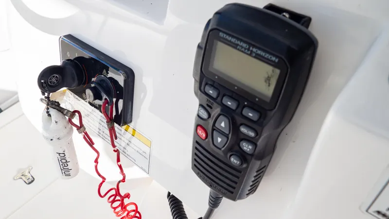  Yacht Photos Pics Close-up of a 2012 Intrepid 400 Center Console boat's control panel and radio.