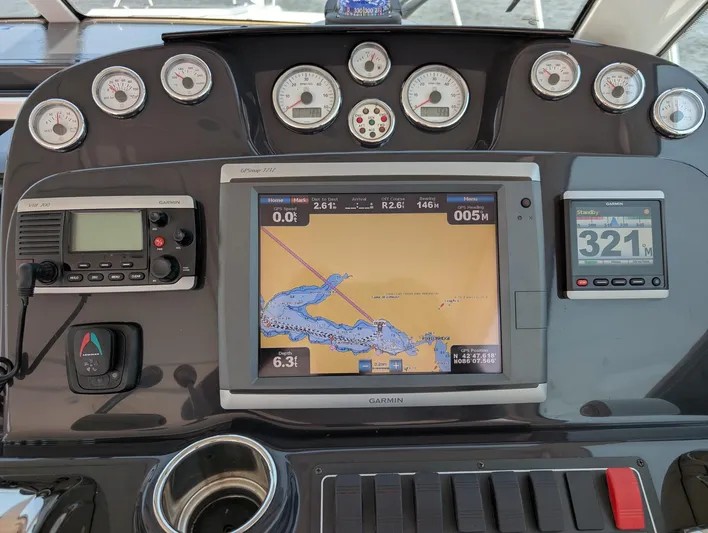 Finale Yacht Photos Pics Dashboard of a 2015 Tiara Yachts 3100 Open with navigation and communication instruments.