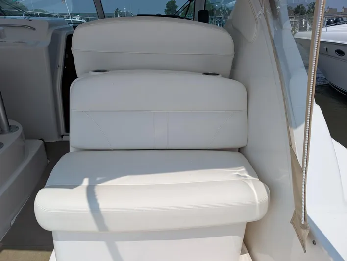 Finale Yacht Photos Pics 2015 Tiara Yachts 3100 Open interior seating, white leather upholstery, luxury boat design.