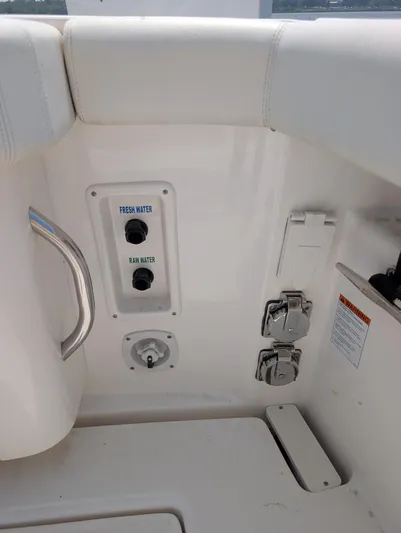 Finale Yacht Photos Pics 2015 Tiara Yachts 3100 Open boat interior with fresh and raw water controls.