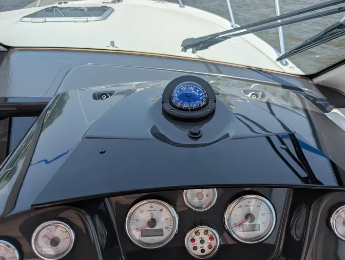 Finale Yacht Photos Pics Dashboard of 2015 Tiara Yachts 3100 Open with compass and gauges.