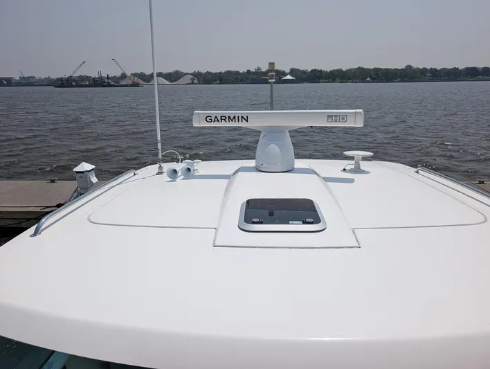 Finale Yacht Photos Pics 2015 Tiara Yachts 3100 Open with Garmin radar on calm waters.