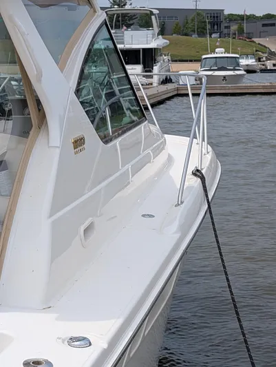 Finale Yacht Photos Pics 2015 Tiara Yachts 3100 Open docked at marina, side view.