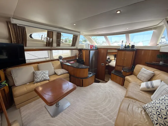  Yacht Photos Pics Luxurious interior of 2001 Carver 396 Motor Yacht with plush seating and elegant decor.