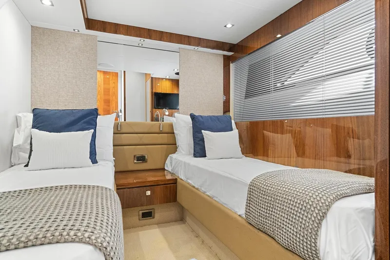 Exit Yacht Photos Pics Luxurious twin cabin interior of 2019 Sunseeker Manhattan 66 yacht.