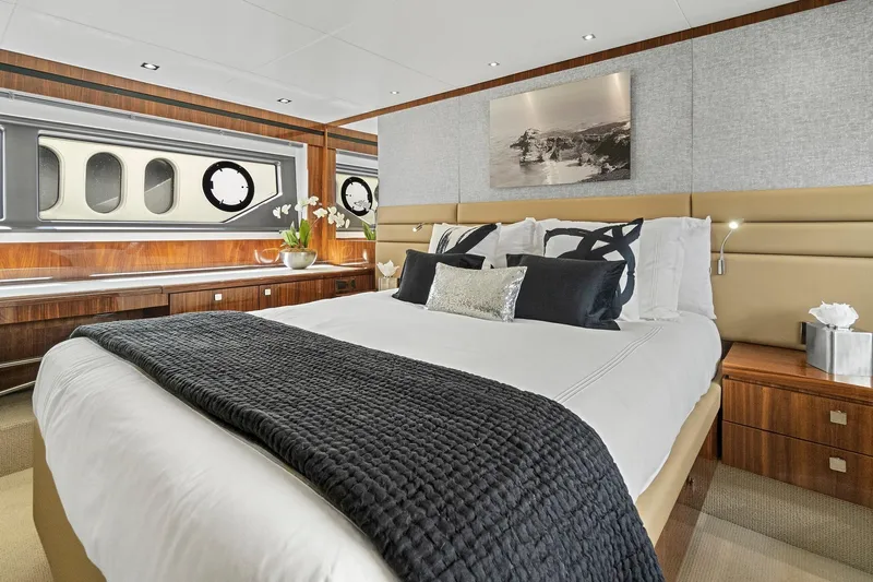 Exit Yacht Photos Pics Luxurious bedroom interior of 2019 Sunseeker Manhattan 66 yacht with elegant decor.