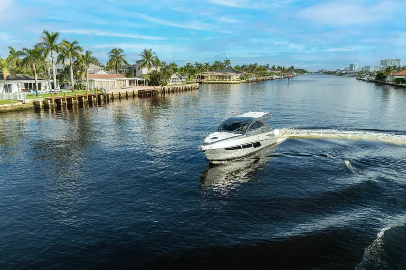  Yacht Photos Pics Luxury Valiatt 410HT yacht cruising on a scenic waterway, 2025 model.