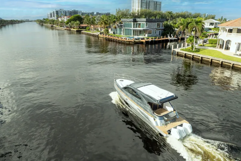  Yacht Photos Pics Luxury Valiatt 410HT yacht cruising a scenic canal, 2025 model.