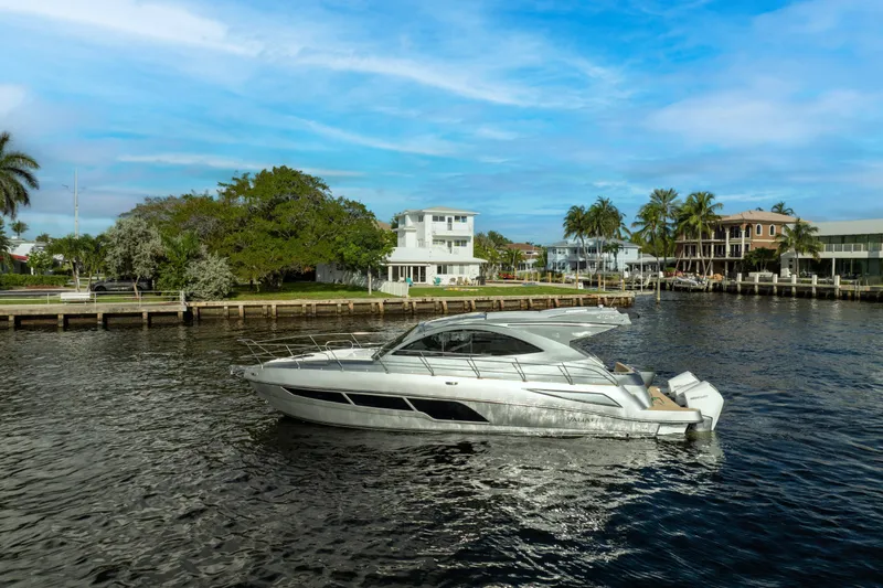  Yacht Photos Pics Luxury Valiatt 410HT yacht cruising near waterfront homes, 2025 model.