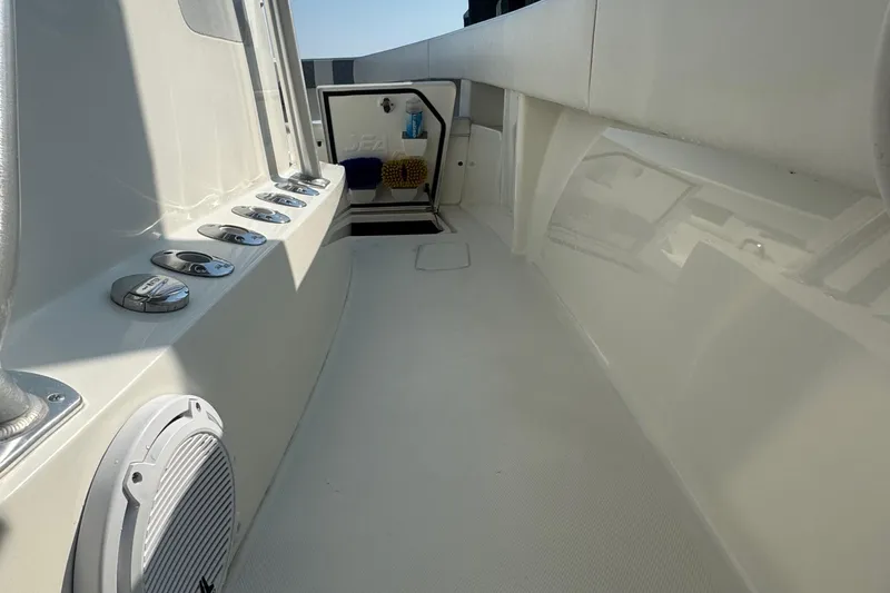 Impatient Yacht Photos Pics 2016 SeaVee 390Z boat interior with storage compartment and speaker.