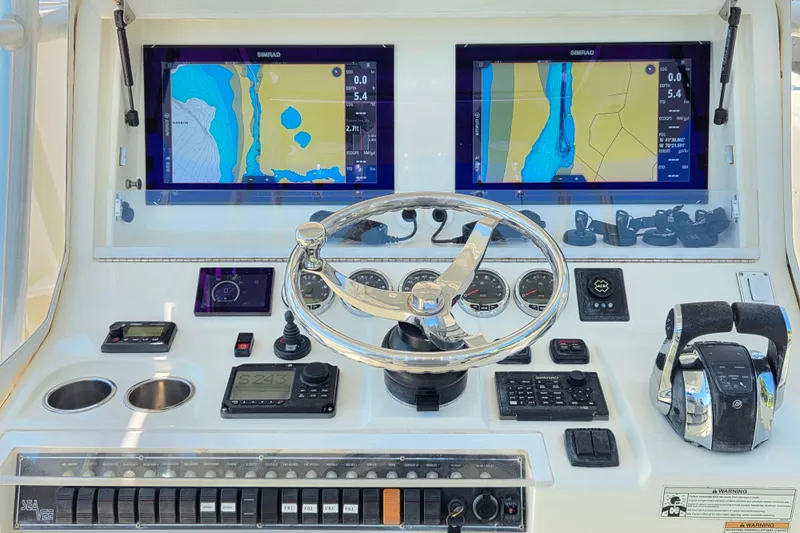 Impatient Yacht Photos Pics 2016 SeaVee 390Z helm with dual Simrad displays and advanced navigation controls.