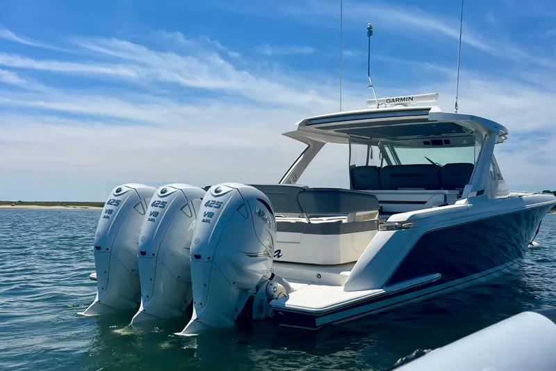 Ivernia Yacht Photos Pics 2020 Tiara Yachts 43 LS with triple Yamaha 425 V8 engines on calm water.