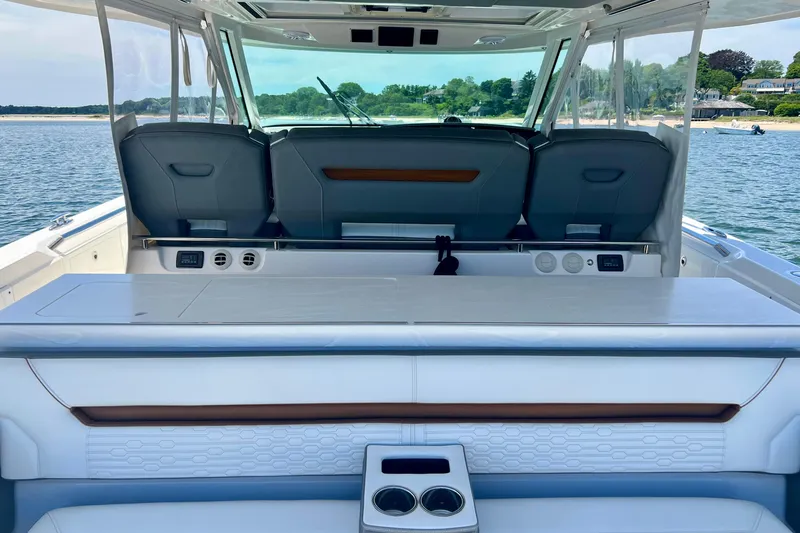 Ivernia Yacht Photos Pics 2020 Tiara Yachts 43 LS interior with seating and ocean view.