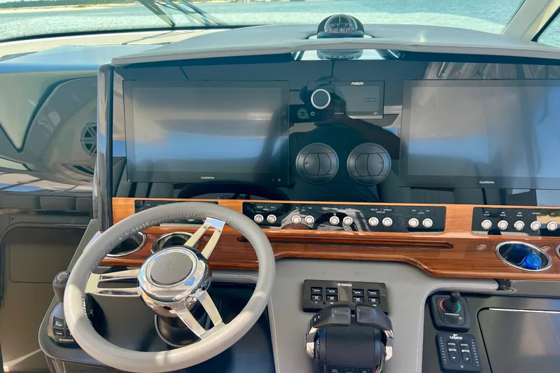 Ivernia Yacht Photos Pics Helm of 2020 Tiara Yachts 43 LS with modern navigation displays and controls.