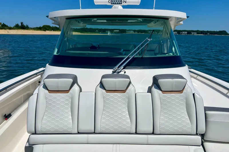 Ivernia Yacht Photos Pics 2020 Tiara Yachts 43 LS boat with luxurious seating on open water.