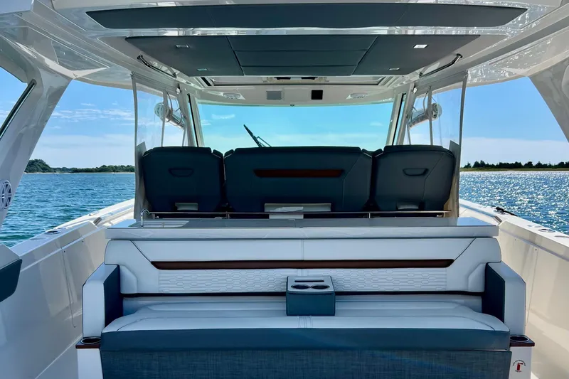 Ivernia Yacht Photos Pics 2020 Tiara Yachts 43 LS luxury boat interior with seating, ocean view.