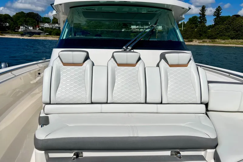 Ivernia Yacht Photos Pics 2020 Tiara Yachts 43 LS boat with luxurious seating on a sunny day.