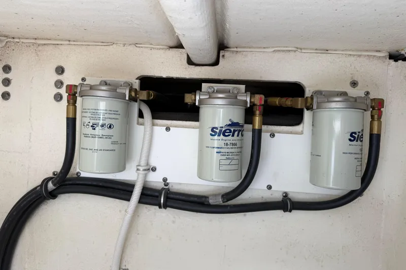Ivernia Yacht Photos Pics Fuel filters in a 2020 Tiara Yachts 43 LS engine compartment.