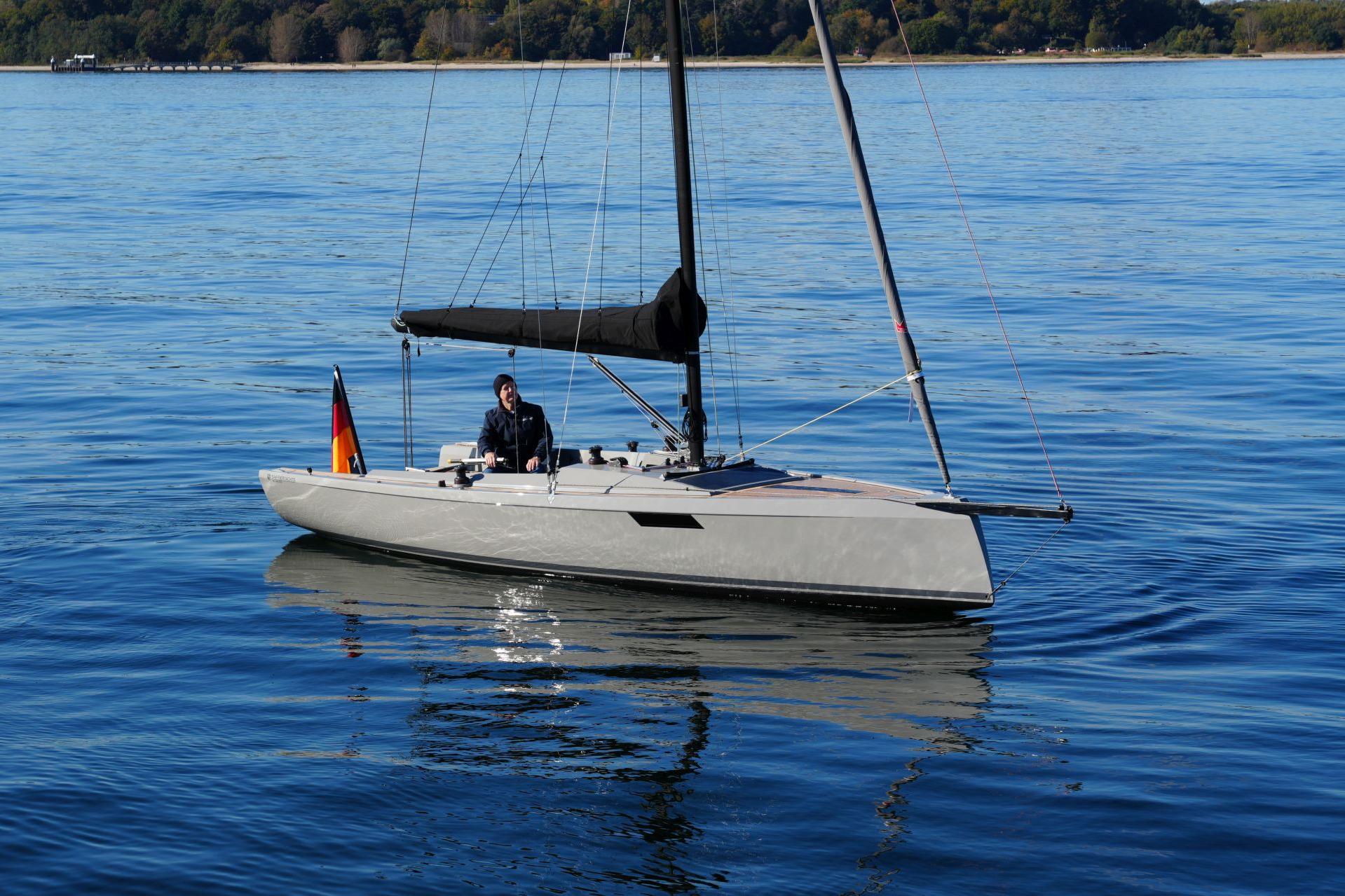 2023 Saffier SE 24 Lite sailboat on calm water with a person onboard.