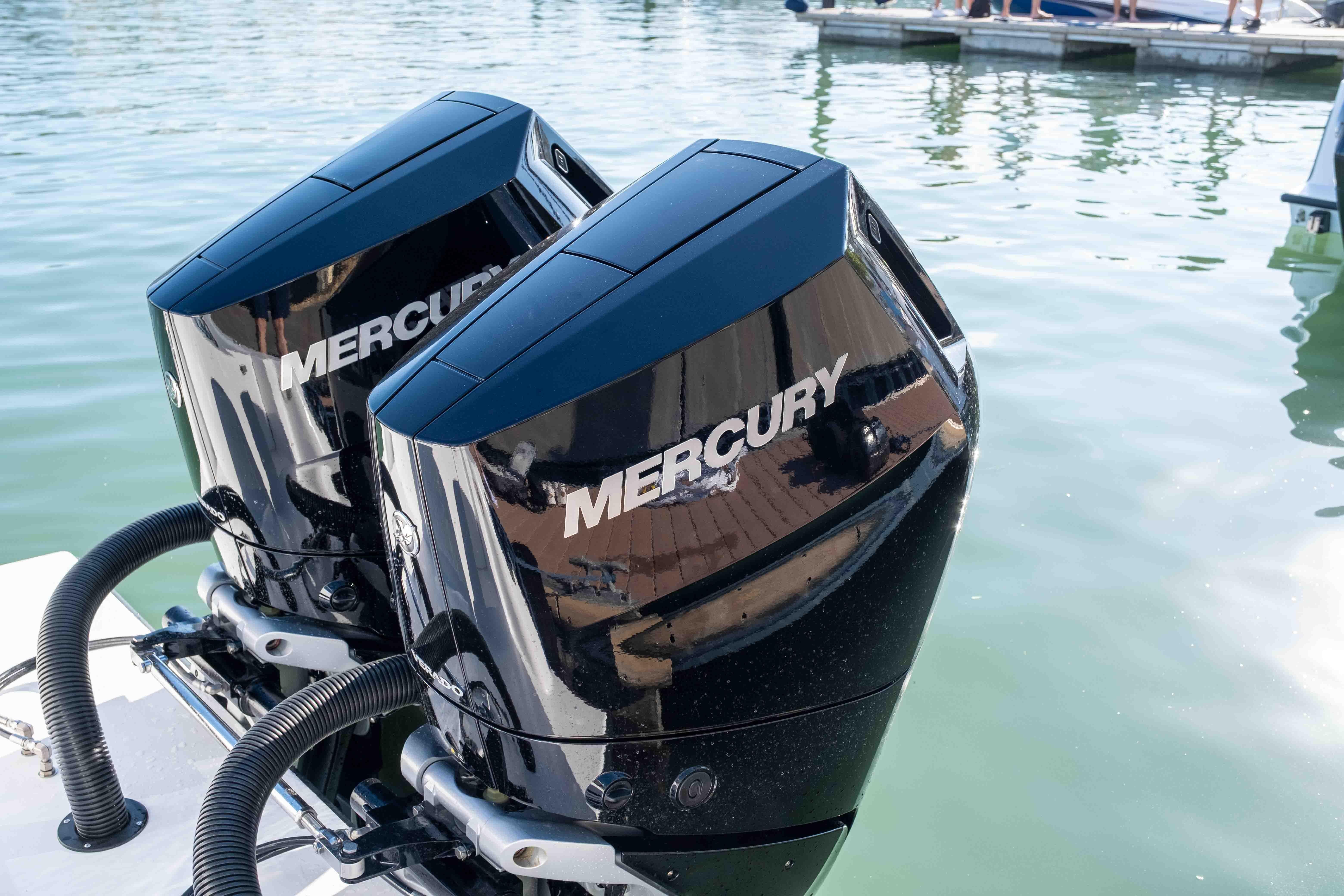 Two Mercury outboard engines on Reef Runner 340 boat, year 2026.