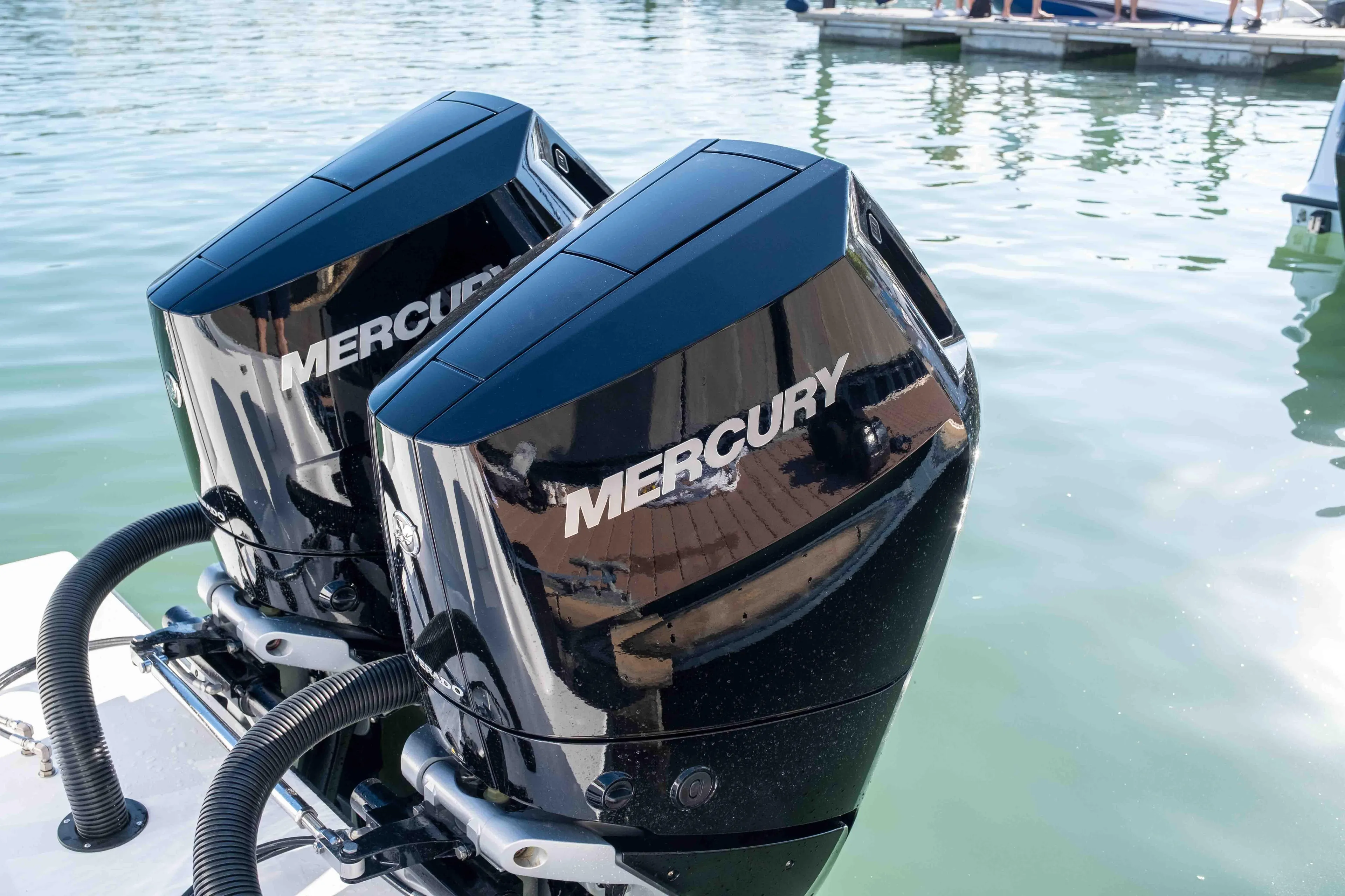 Two Mercury outboard engines on Reef Runner 340 boat, year 2026.