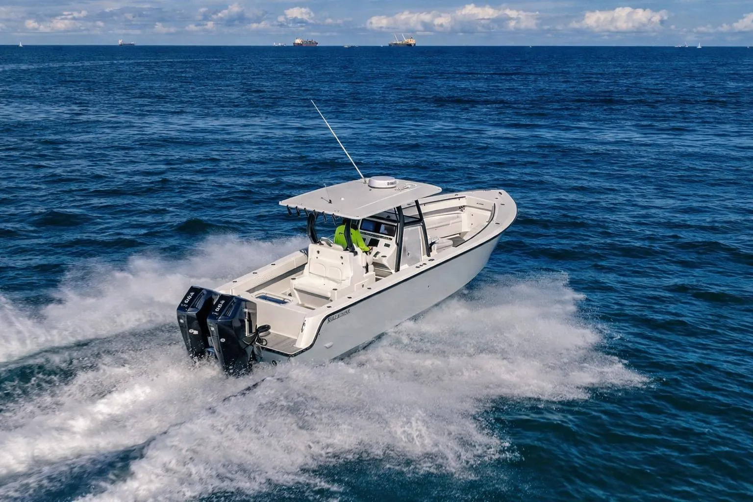 Reef Runner 340 boat 2026 cruising on open sea.