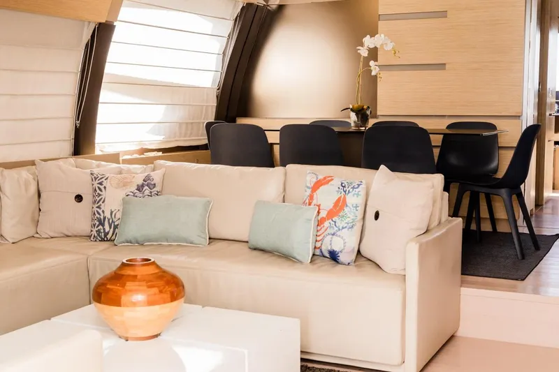  Yacht Photos Pics Luxurious interior of 2013 Ferretti Yachts 720 with elegant seating and dining area.